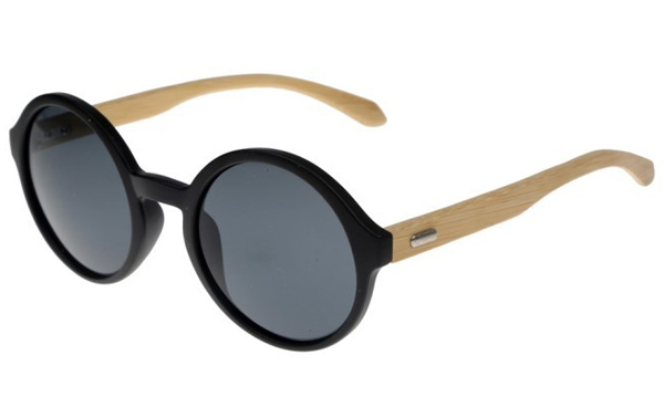 Oversize round sunglasses in black with handmade bamboo arms. Robust quality