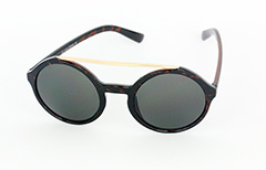 Large round sunglasses in dark tortoiseshell